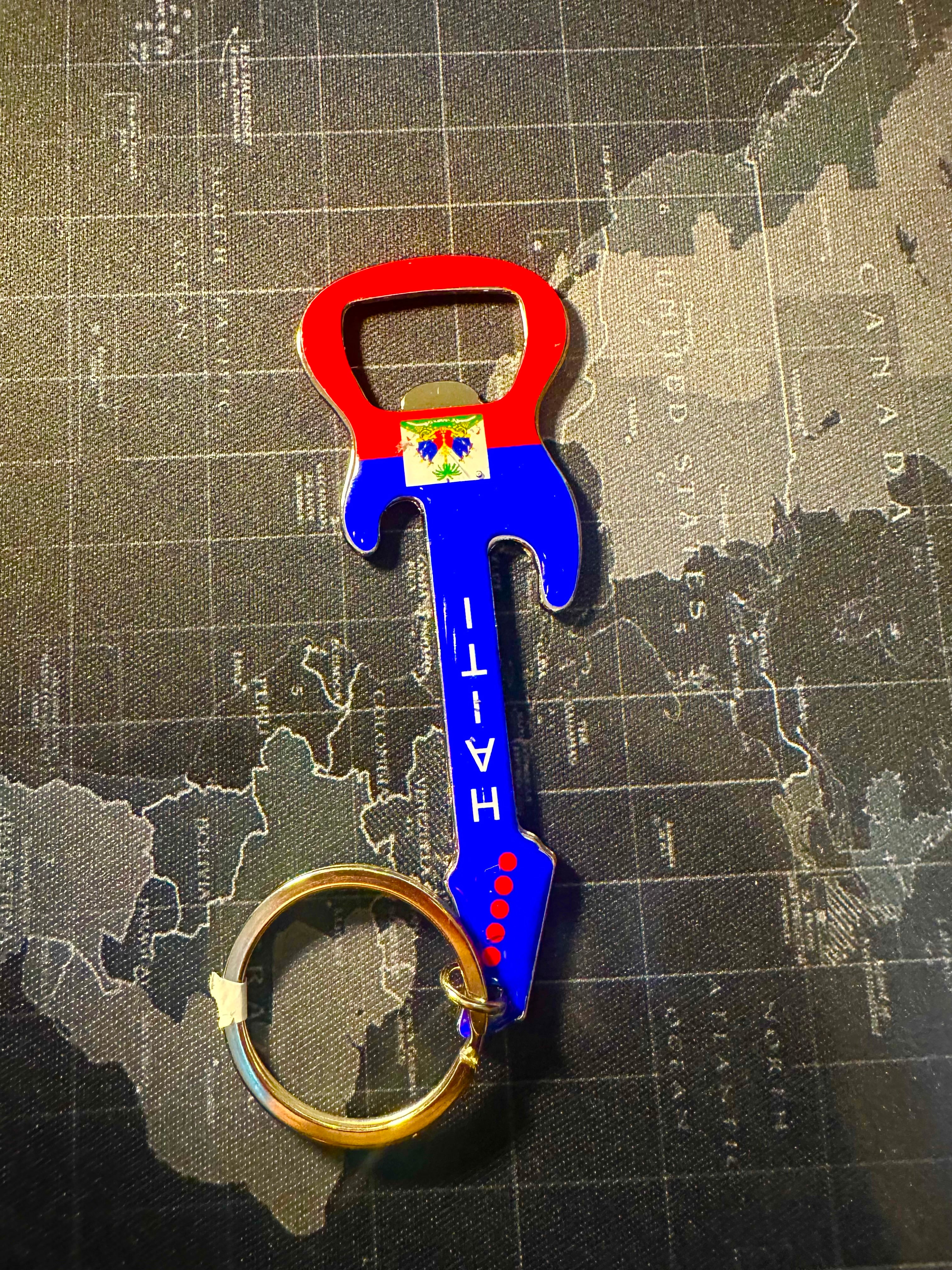 Haitian style bottle opener