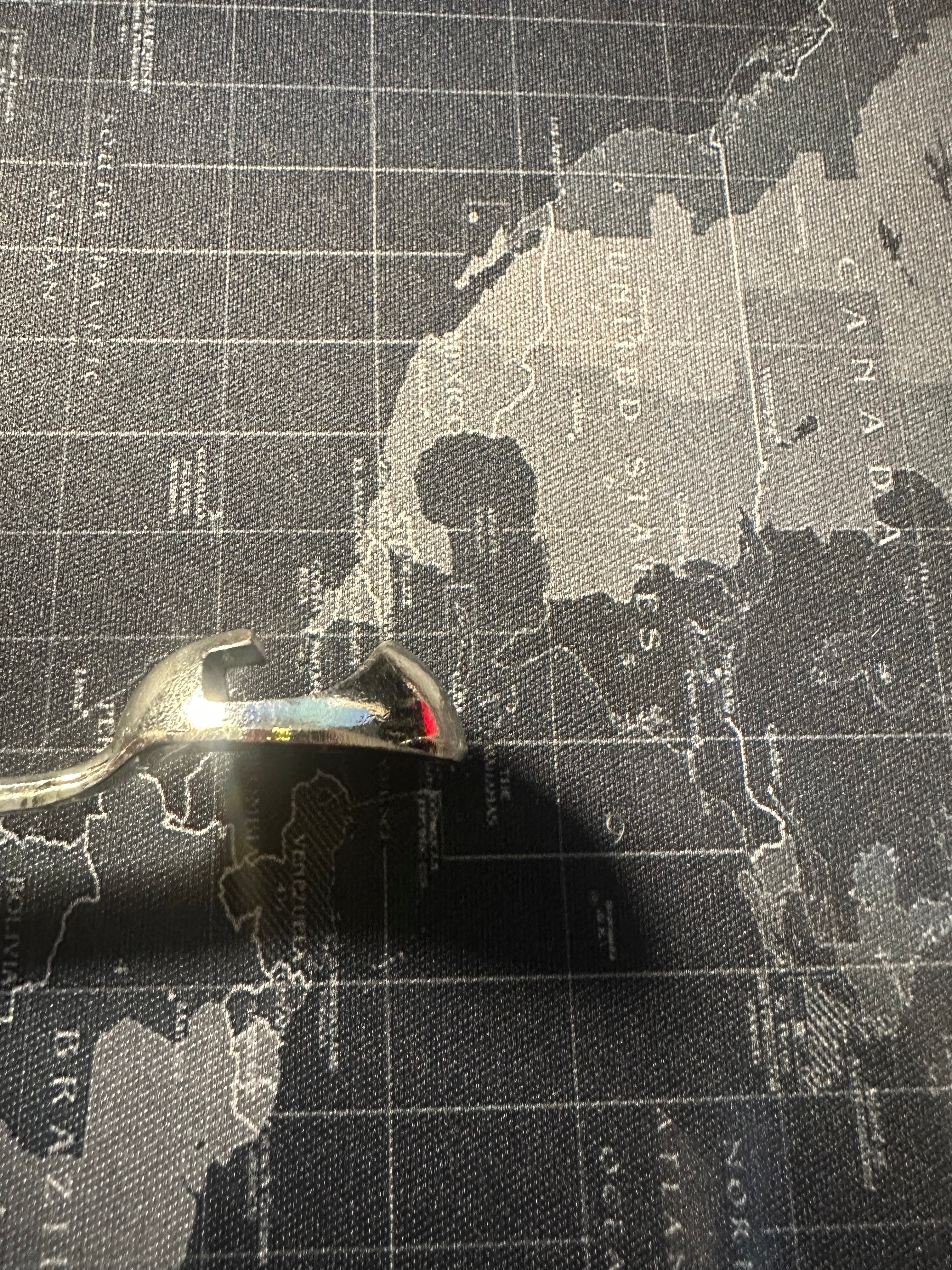 Haitian spoon bottle opener